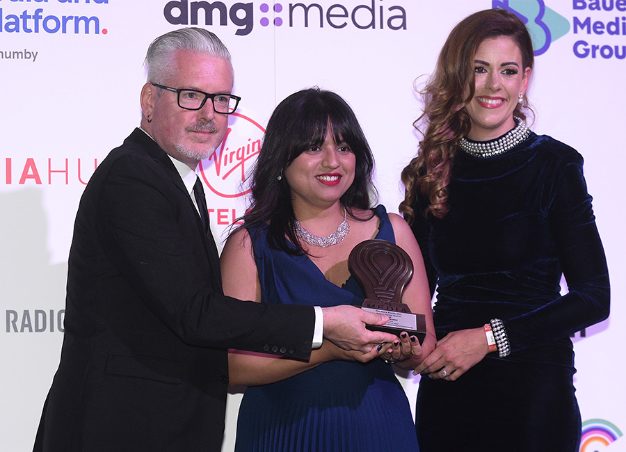 Doug Farrell (left), group head of digital advertising strategy at dmg media, presents an award at the Media Awards 2025 at The Mansion House in Dublin. Pic: Justin Farrelly
